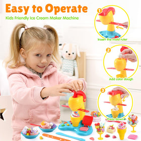 PLAY Kids using the ice cream machine to make scoops during play.