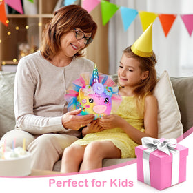 Play Tailor unicorn piggy bank features bottom knob for easy retrieval.
