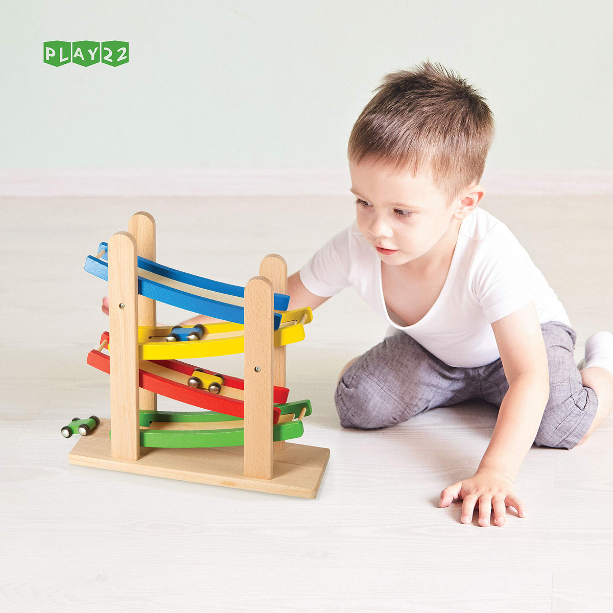 Play22 four wooden cars for racing and early STEM exploration.