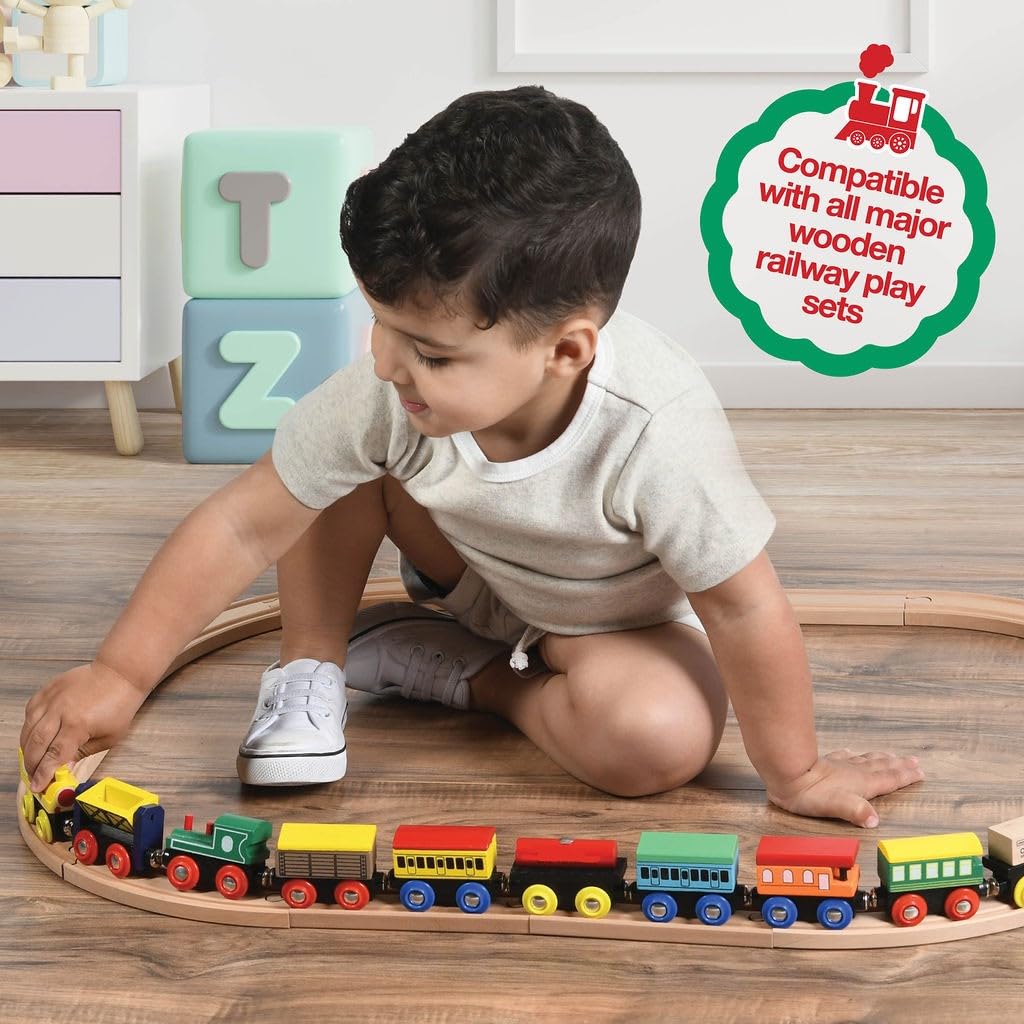Play22 wooden tender car paired with engines for extended train setups.