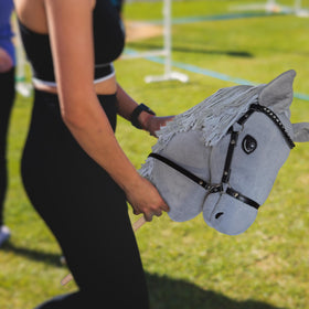 Clear side profile of the Playful Minds grey hobby horse for display or practice.