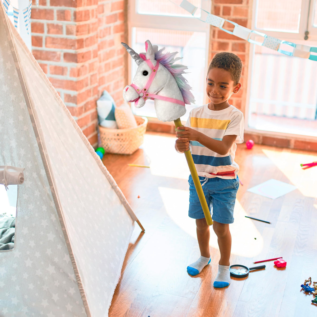 Playful Minds ear-squeeze sound feature activates neighs and hoof beats during pretend play.