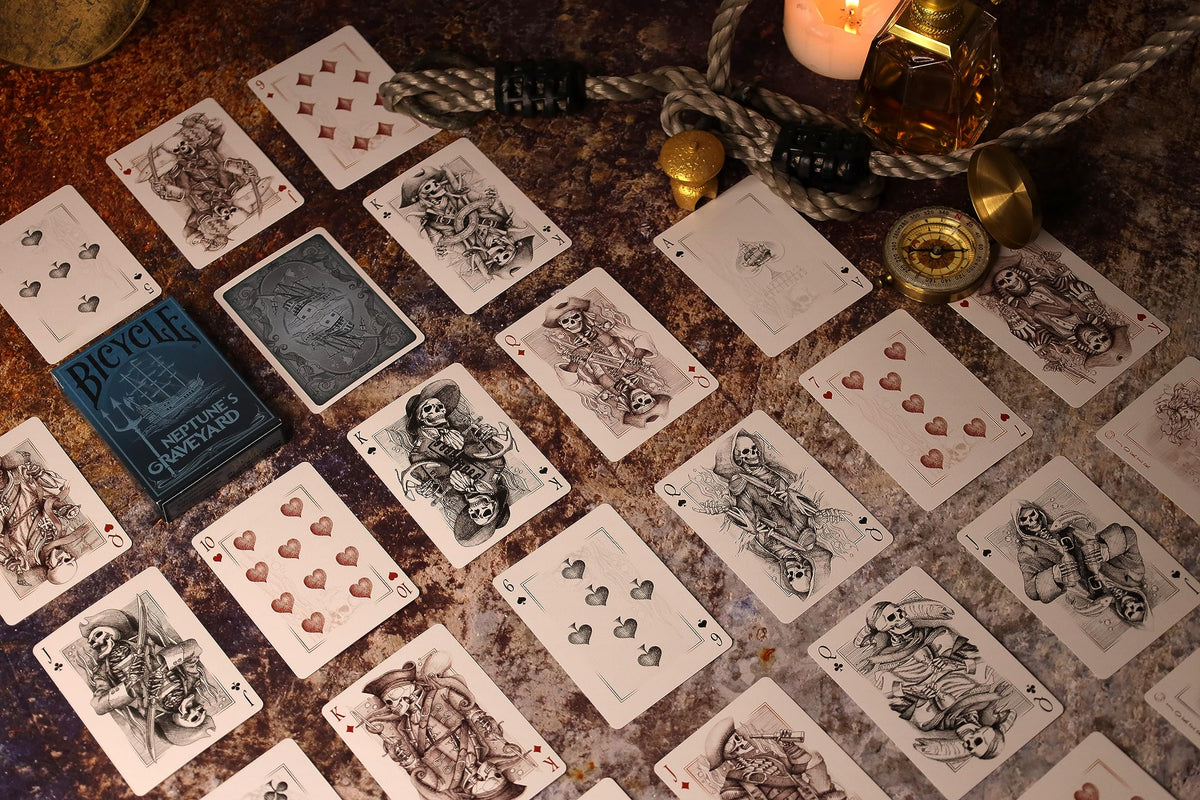 Neptune's Graveyard card spread by PLAYING CARD DECKS.COM showcases vivid artwork and smooth feel.