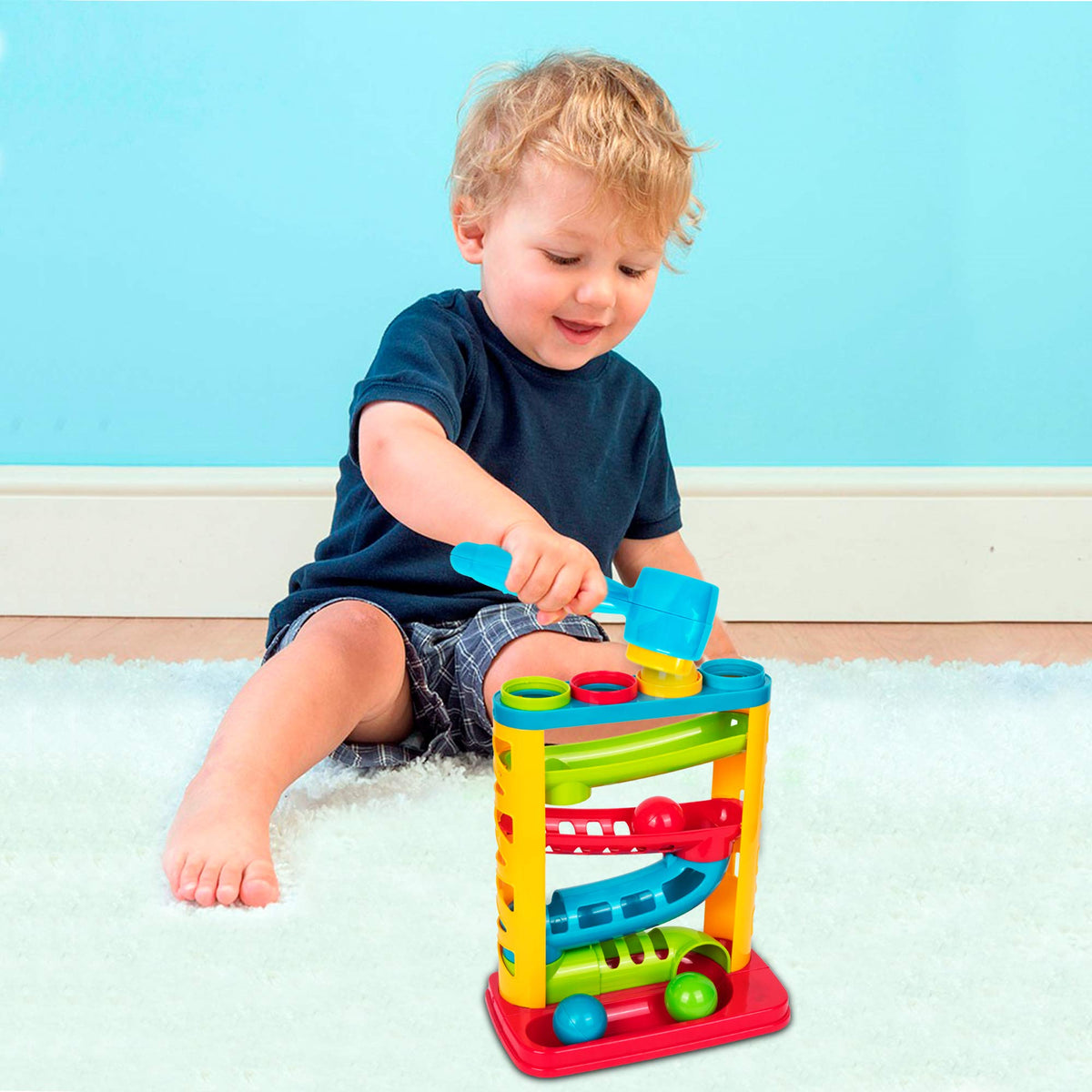 Playkidz pound hammer close-up showing easy grip for little hands.