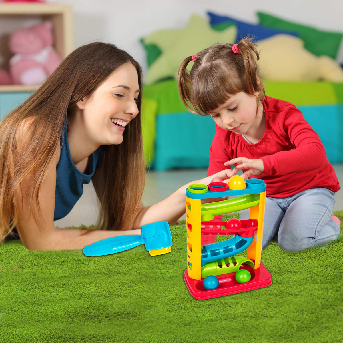 Playkidz pound a ball child playing demonstrates engaging, kid-friendly learning activity.