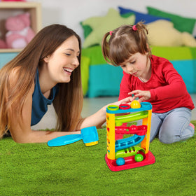 Playkidz pound a ball child playing demonstrates engaging, kid-friendly learning activity.