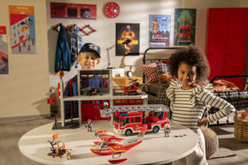 Playmobil 360-degree ladder enables dynamic angles during pretend rescues.