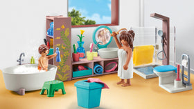 Playmobil sink, toilet, and hamper encourage organized pretend chores.
