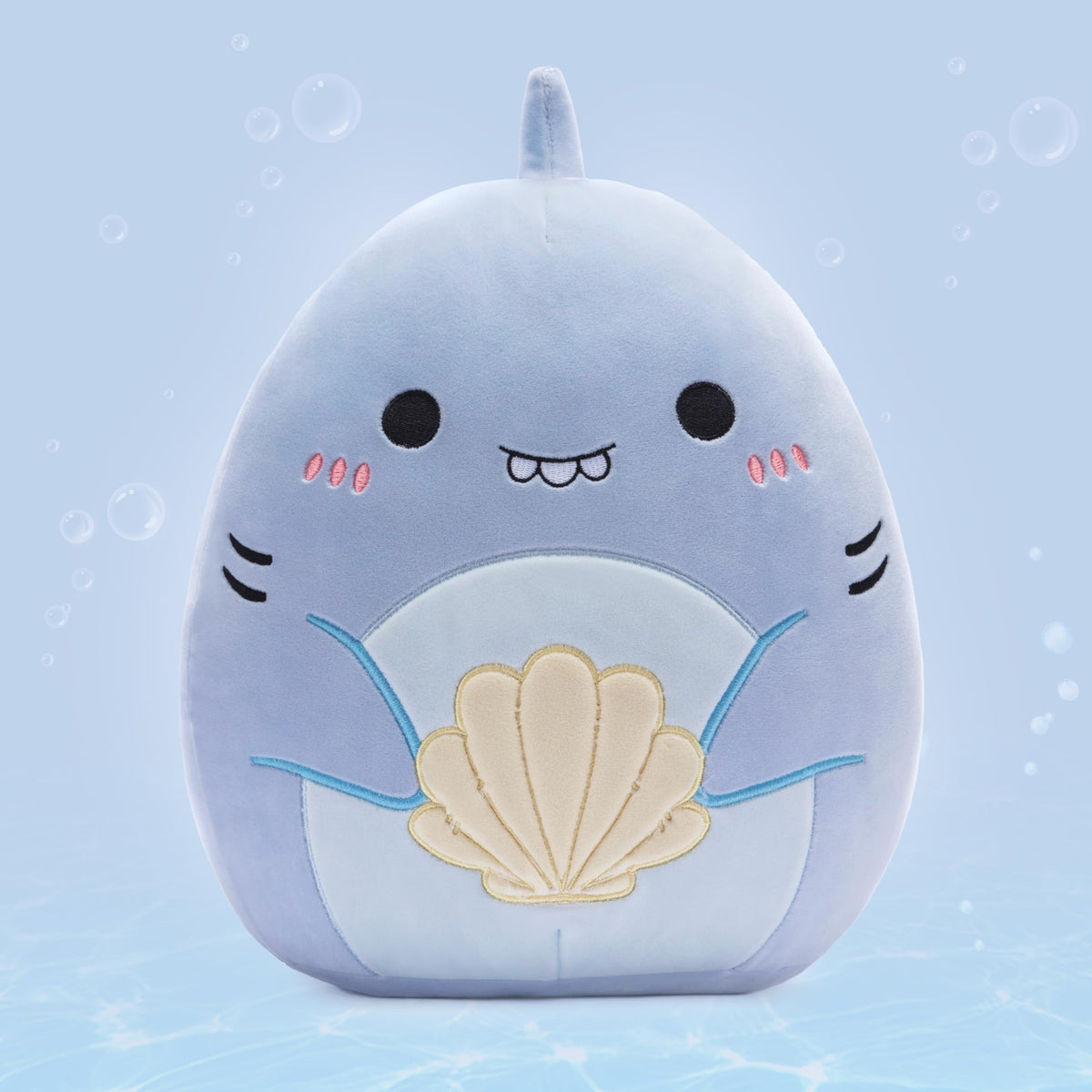 PLAYNICS shark plush pillow provides soft support during reading and lounging.