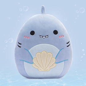 PLAYNICS shark plush pillow provides soft support during reading and lounging.