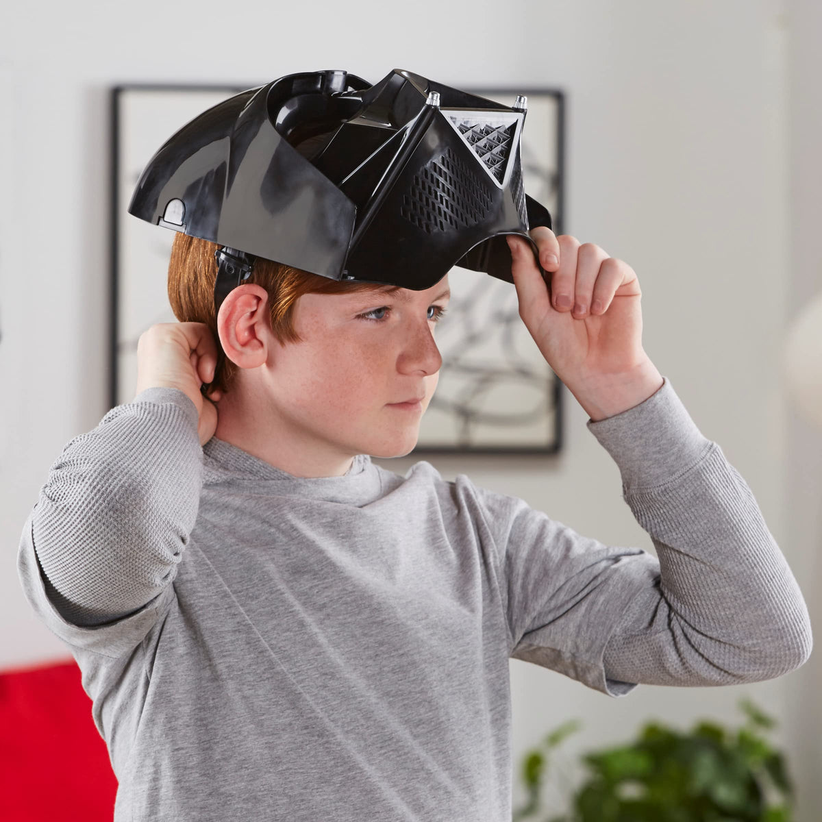 Playskool Darth Vader mask close-up highlighting voice changer feature.