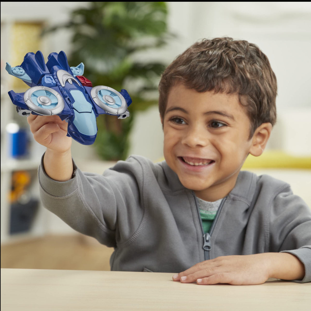 Playskool Rescue Bots conversion demo showing robot to vehicle action