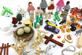 PlayTherapySupply sandtray bridge and wishing well pieces inspire narrative progression.