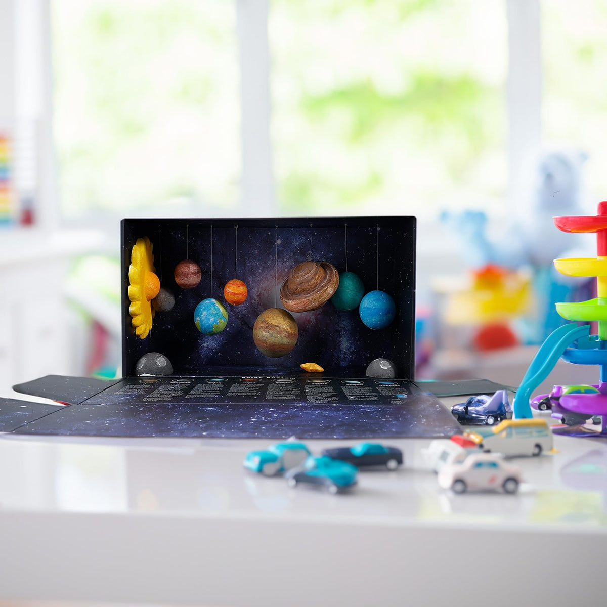 Pllieay 3D Solar System hanging planets in the starry display box.