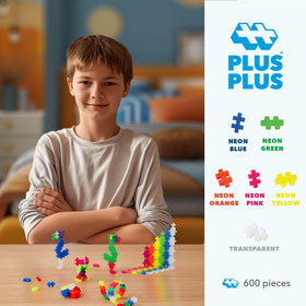 Kids build 3D structures with Plus Plus bricks, exploring space and form.