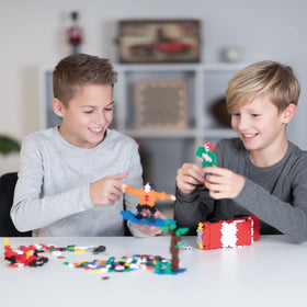 Plus Plus color bricks closeup showing interlocking design for open-ended play