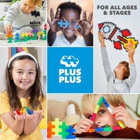 PLUS PLUS guide book inspires step-by-step builds and ideas.