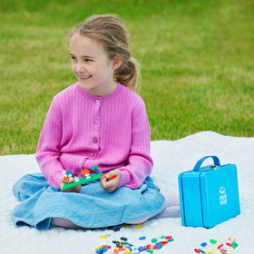 PLUS PLUS guide book for building introduces simple project ideas.