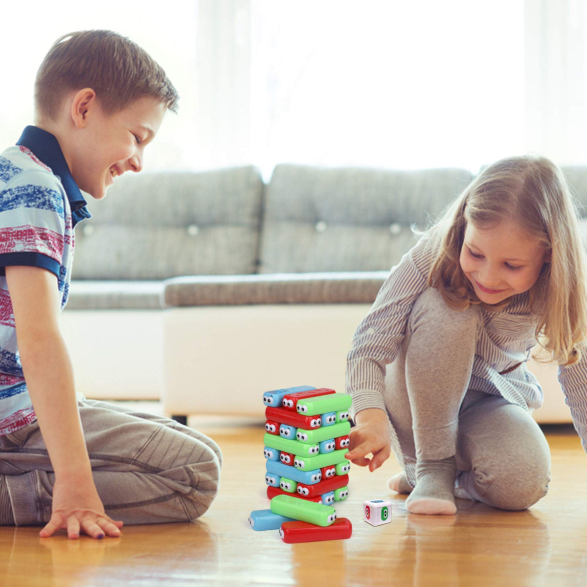 Point Games Googly Tower assembly supports cooperative play during family gatherings.
