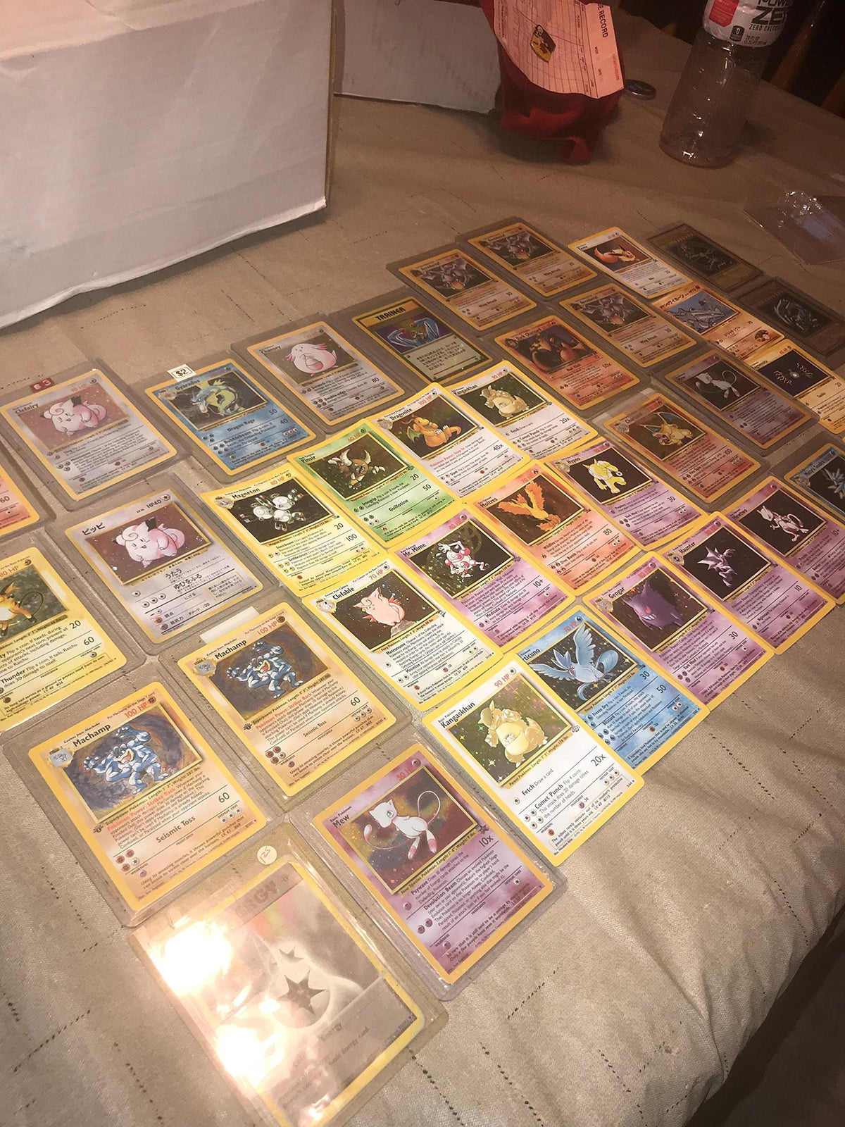Pokémon 1st/2nd Gen pack with holographic cards for collectors.