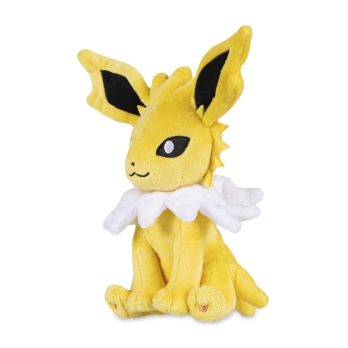 Pokémon Center Jolteon Sitting Cuties Plush sits upright on a desk for playful display.