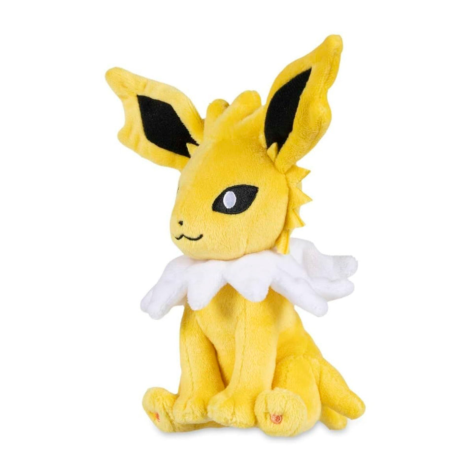 Pokémon Center Jolteon Sitting Cuties Plush sits upright on a desk for playful display.