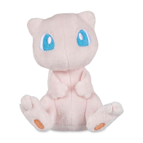 Pokémon Center Mew Sitting Cuties Plush sits up for desk display on a shelf