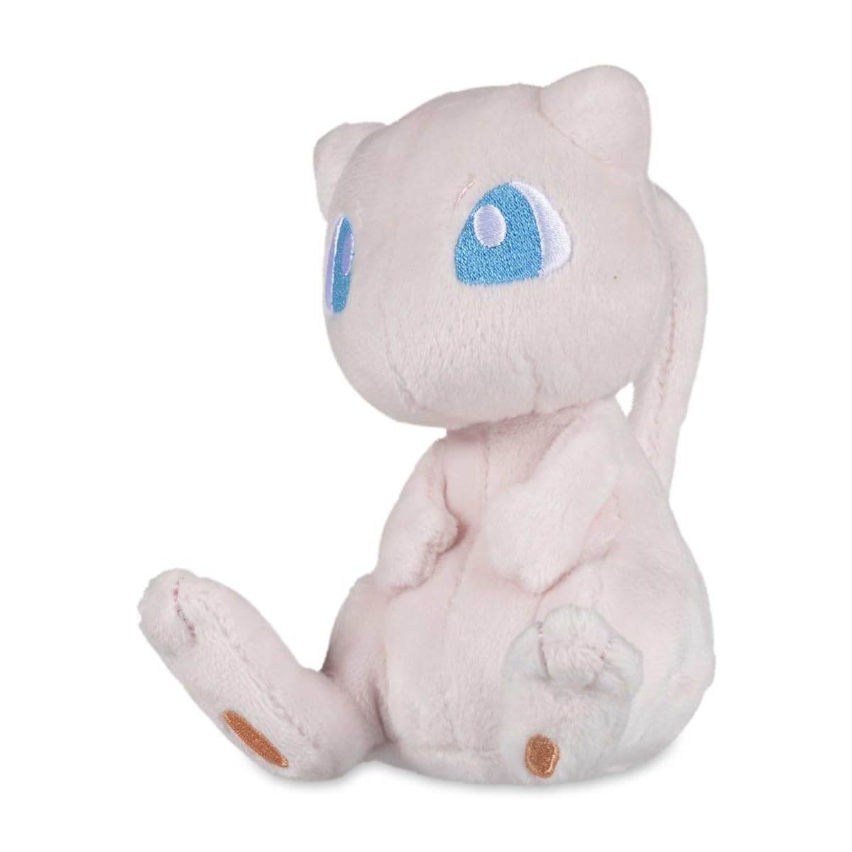 Pokémon Center Mew Sitting Cuties Plush with weighted microbeads sits upright on a desk
