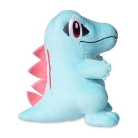 Compact Totodile plush measures about 7 1/4 inches tall and 6 1/2 inches long.