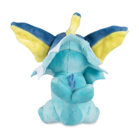 Vaporeon Sitting Cuties Plush on a flat surface, ideal desk buddy.