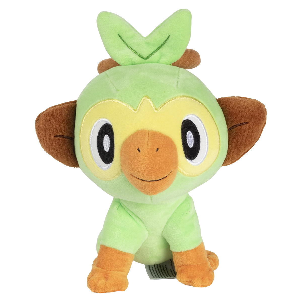 Pokémon Grookey plush close-up, soft green fur and friendly face.
