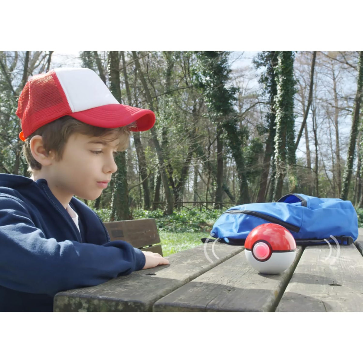Pokémon Trainer Guess Batteries Included label marks ready-to-play experience.