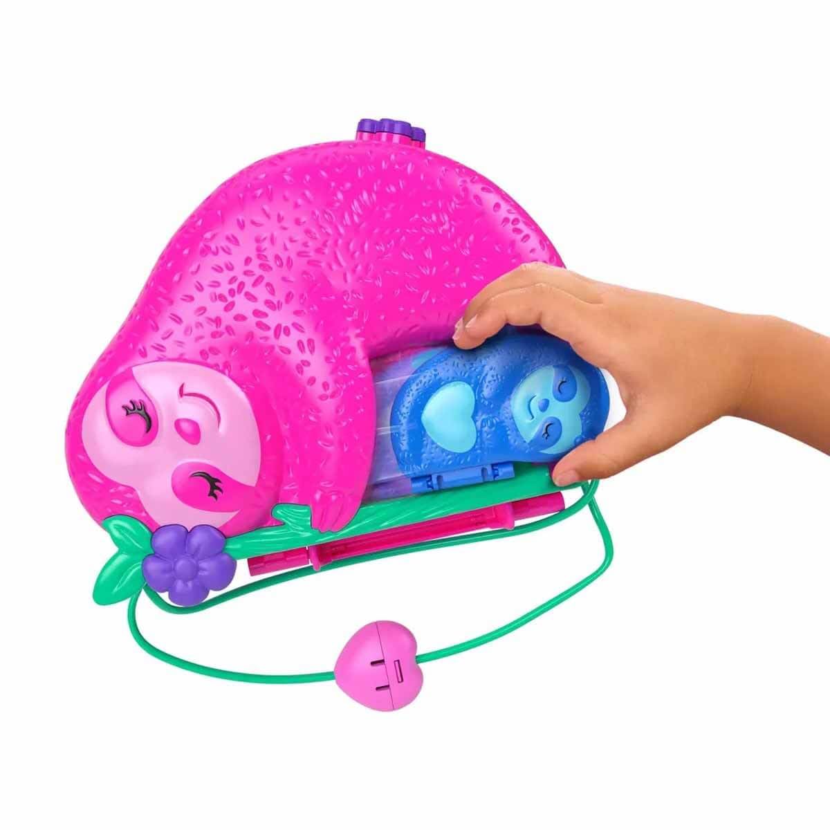 Polly Pocket baby sloth compact open reveals secret beach and boats.