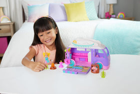 Polly Pocket glamping camper interior opens to a campsite setup for imaginative adventures.