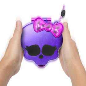 Polly Pocket Monster High micro doll Frankie Stein sparks spooky adventures in compact form.