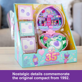 Polly Pocket party stamps and birthday cake opens to an inkwell for stamping.
