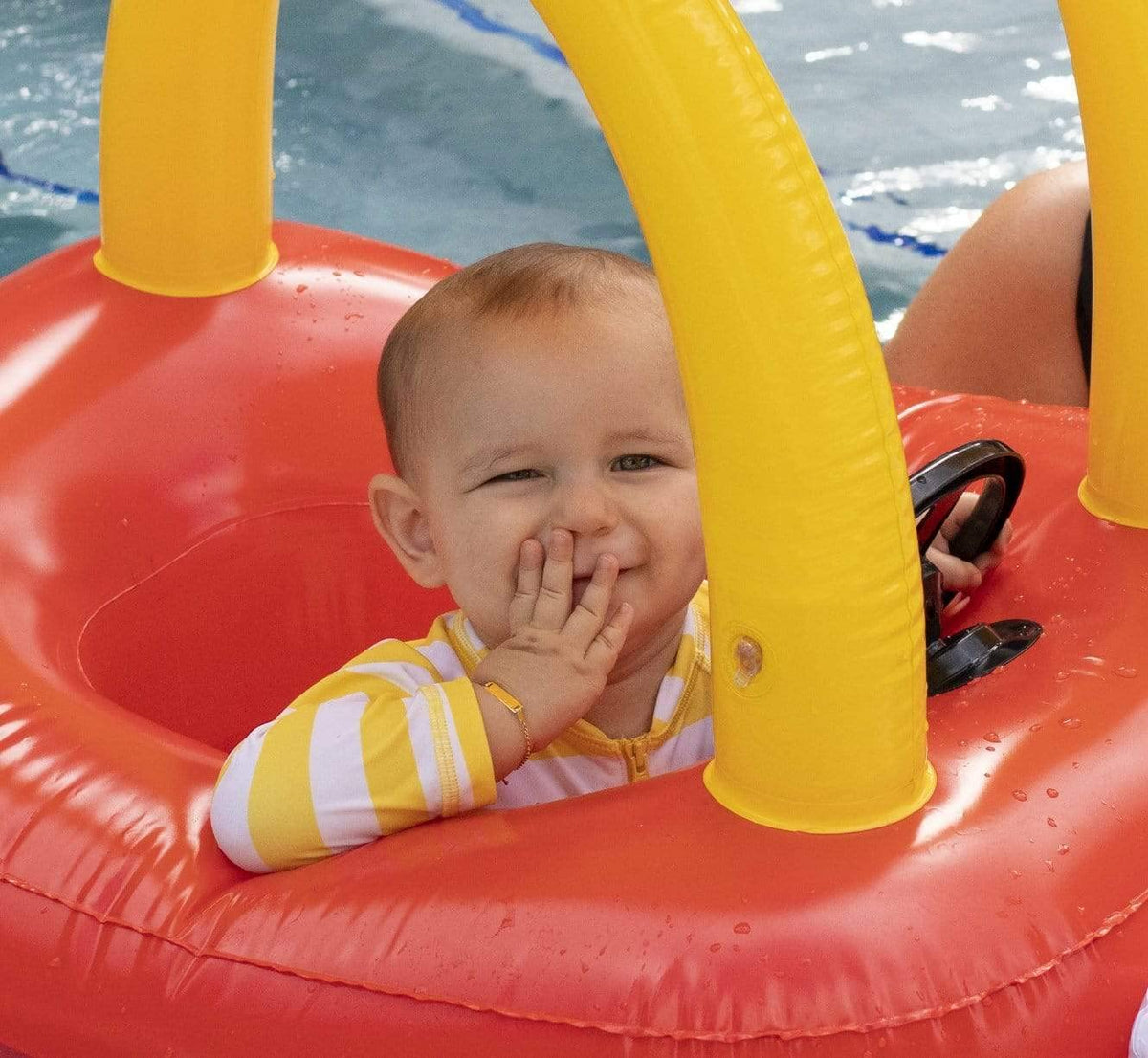 PoolCandy Cozy Coupe Float durable PVC construction supports multiple pool adventures.