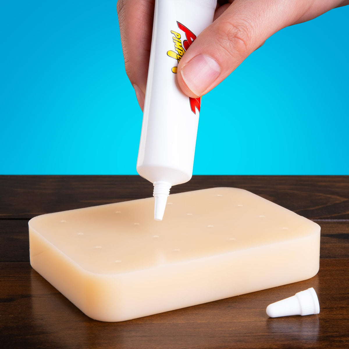Pop It Pal pimple pus bottle displayed for a natural refill experience