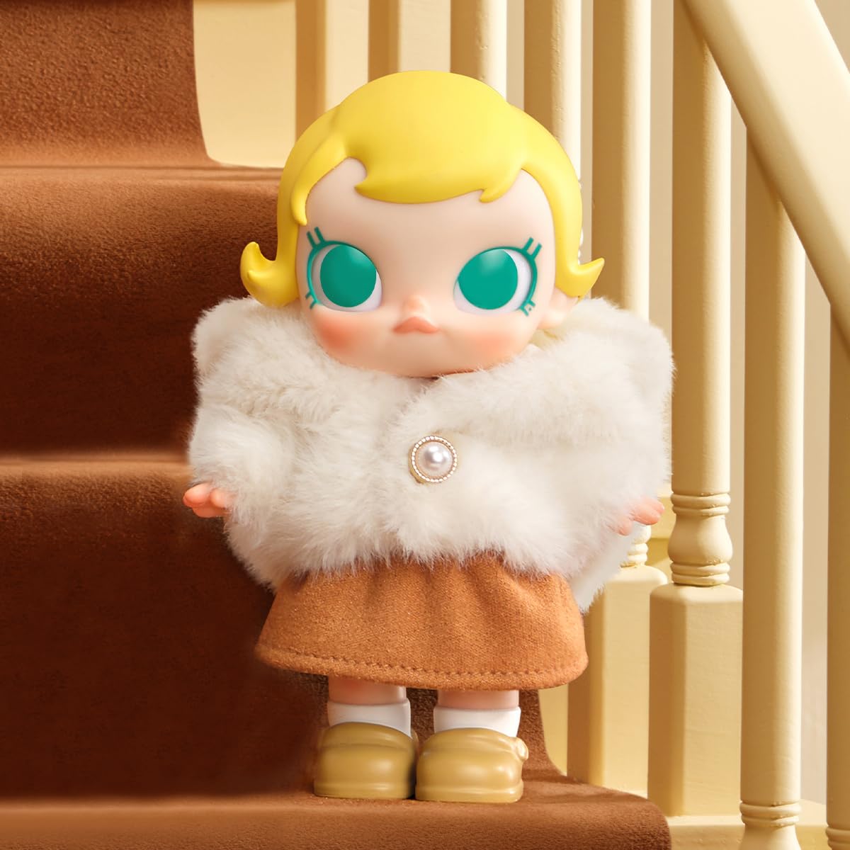 POP MART Baby Molly vinyl plush figure ideal for shelf decor.