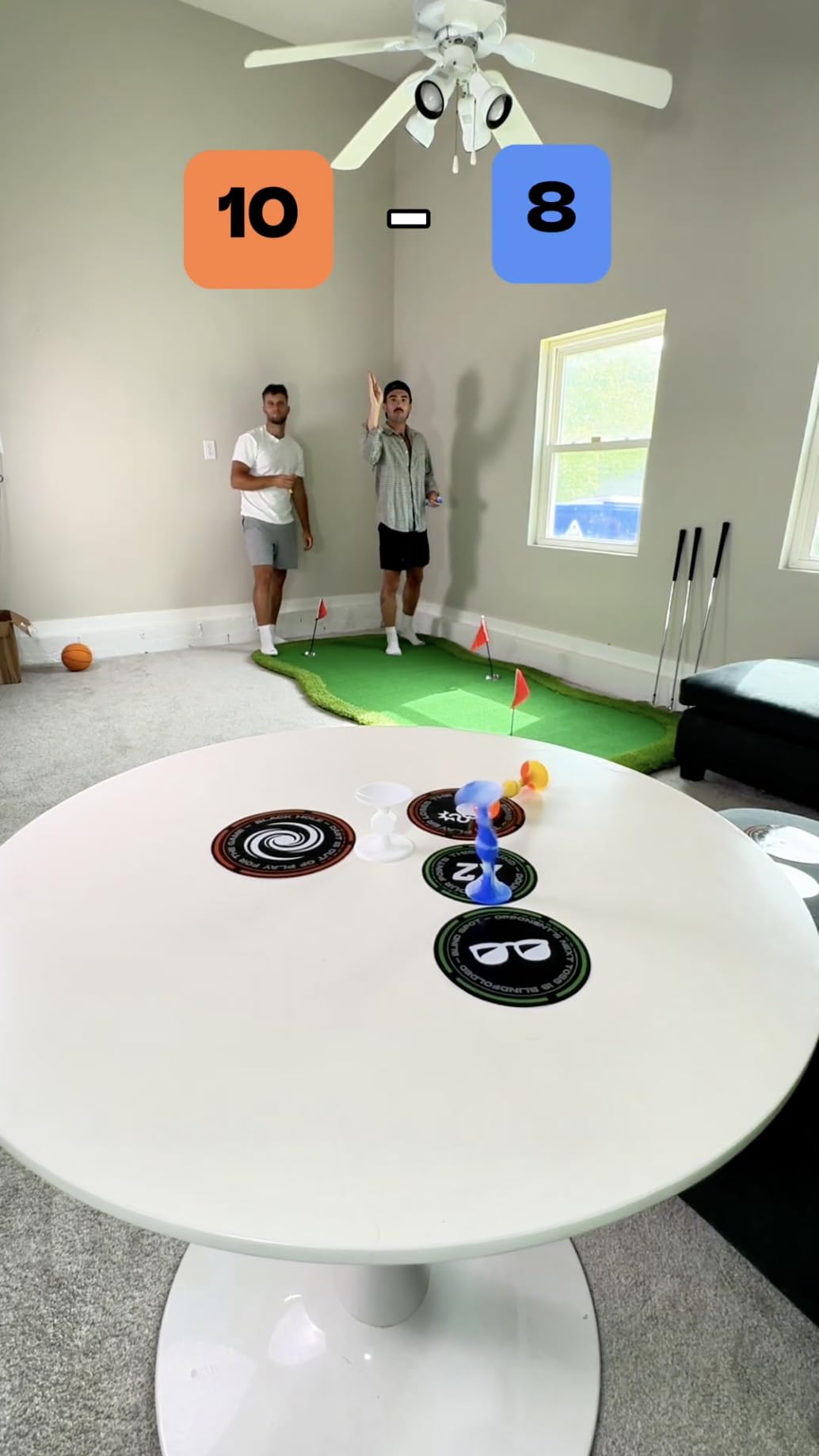 Popdarts PowerSpots play on glass surface enables versatile setups around the home.