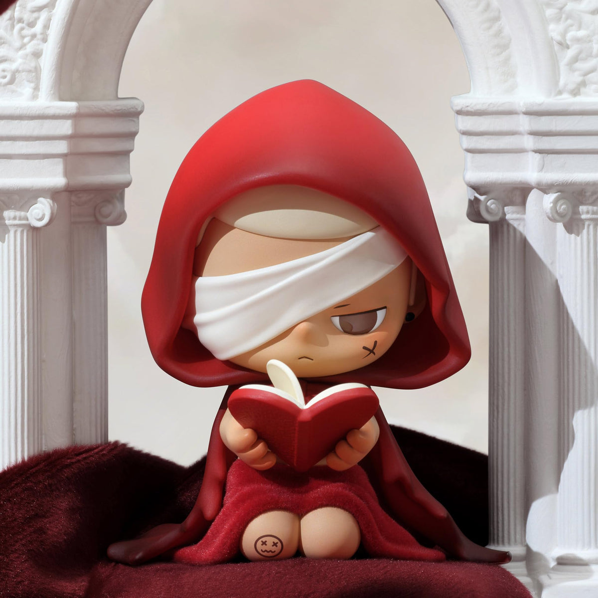 Close-up of premium paint finish on POP MART KUBO Angel's Poem figure.