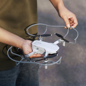 Potensic 360° propeller guard side view shows full coverage for beginners.