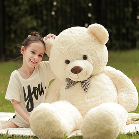 Poutmac teddy bear in bedroom decor, cozy display