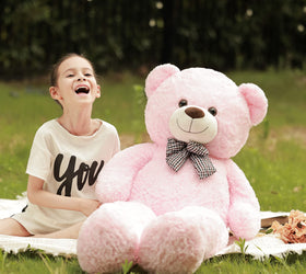 Poutmac teddy bear in a cozy hug pose suggests comfort