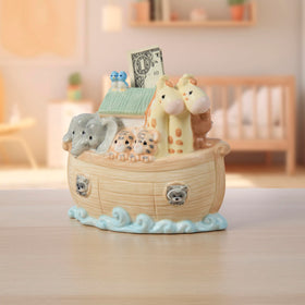 Precious Moments Noah's Ark nursery display with coins saved