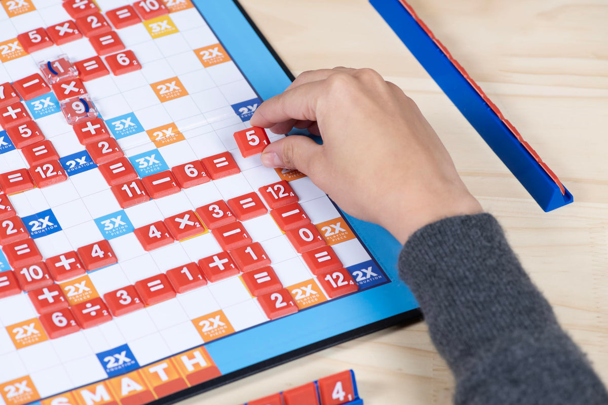 Pressman Smath packaging shown with colorful tiles.
