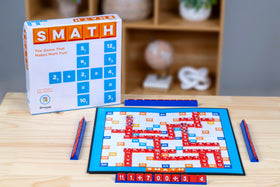 Pressman Smath players in action forming math equations on the board.