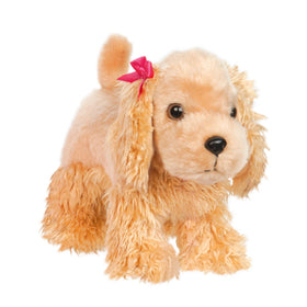 Pucci Pups pink comb for grooming and silk-soft fur care.