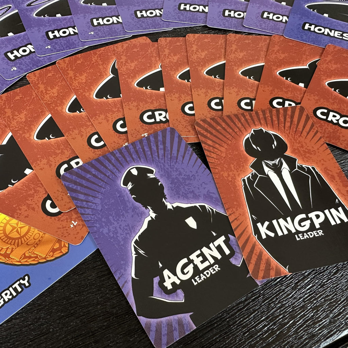 Close-up of tokens and cards in Good Cop Bad Cop