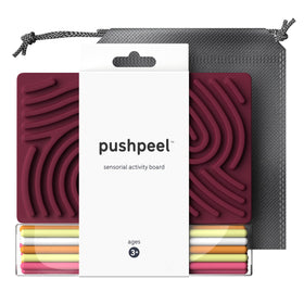 Pushpeel Sensory Board close-up showing strings for tactile exploration and focus.